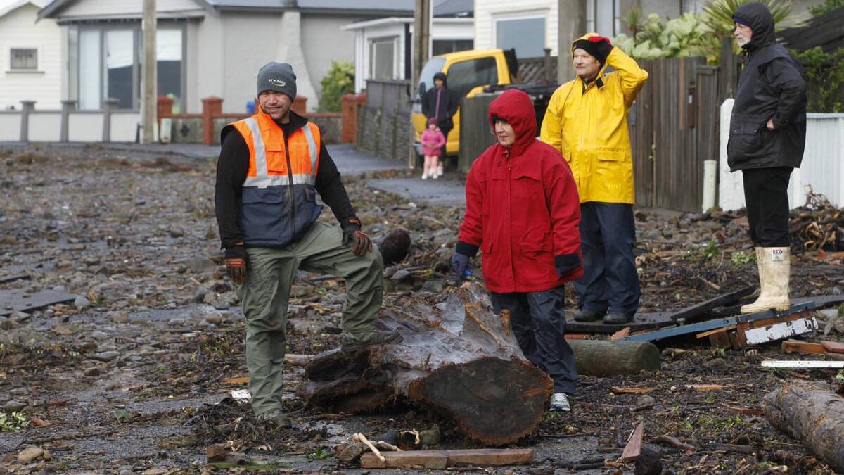 Residents begin to clean-up in Wellington. Picture: PHIL REID