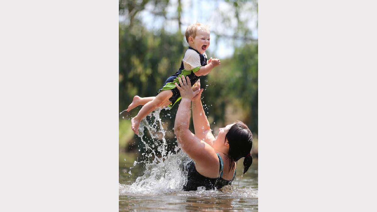 Erin Phillips, 19, plays with her daughter Mary Purton, 19 months, at Sydney park in Wangaratta. Picture: JOHN RUSSELL