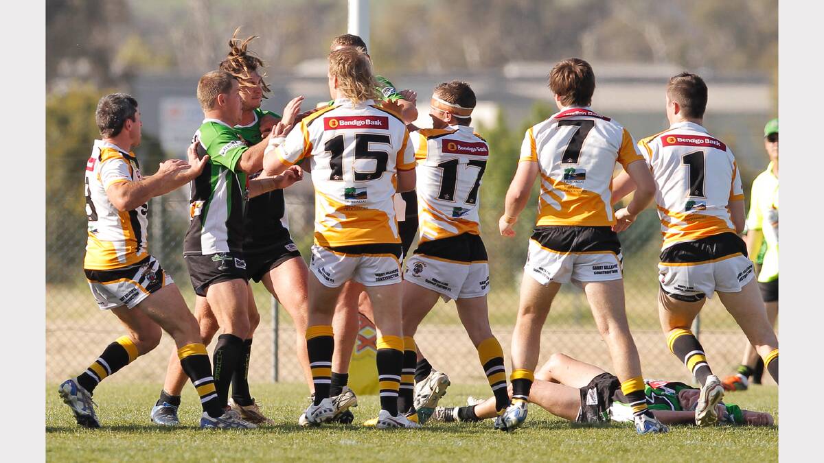 Albury's Mitch McLeod lays on the ground during a brawl