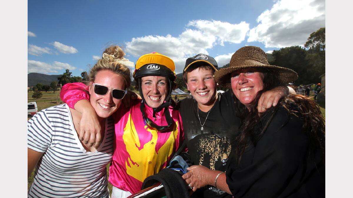 Jockey Amber Comb celebrates with family members Kate Comb 18, Rex Comb, 12, and mum Angela Comb after winning four races.     