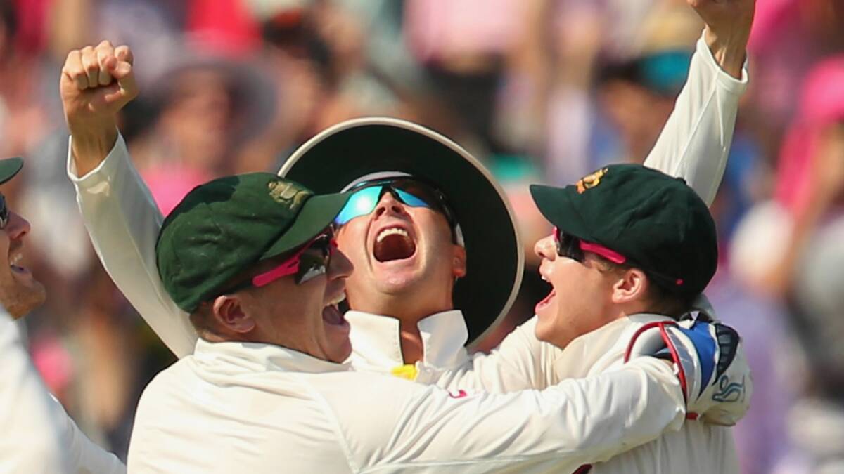 Michael Clarke celebrates winning the fifth day of the Ashes test match with his team. Picture: GETTY IMAGES