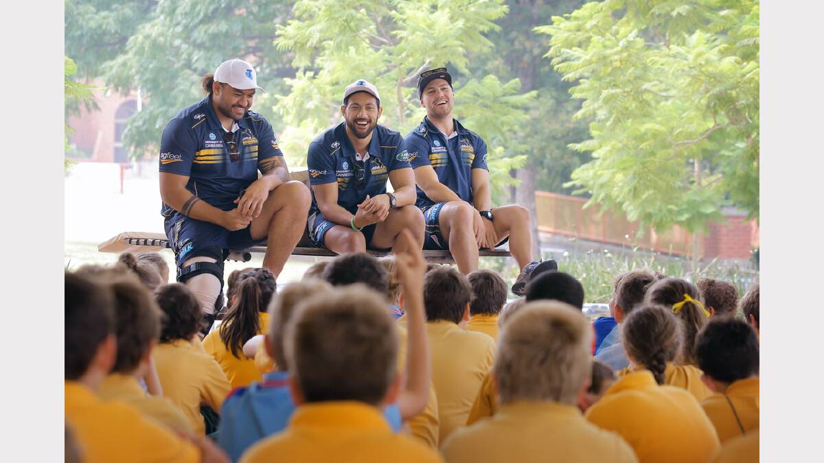 Christian Lealiifano and the Brumbies Southern Inland Development Officer Jack Vurey share a laugh during question time.