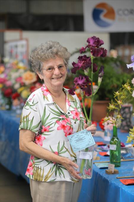Corowa’s Lorraine Anderson with her prize-winning flowers.