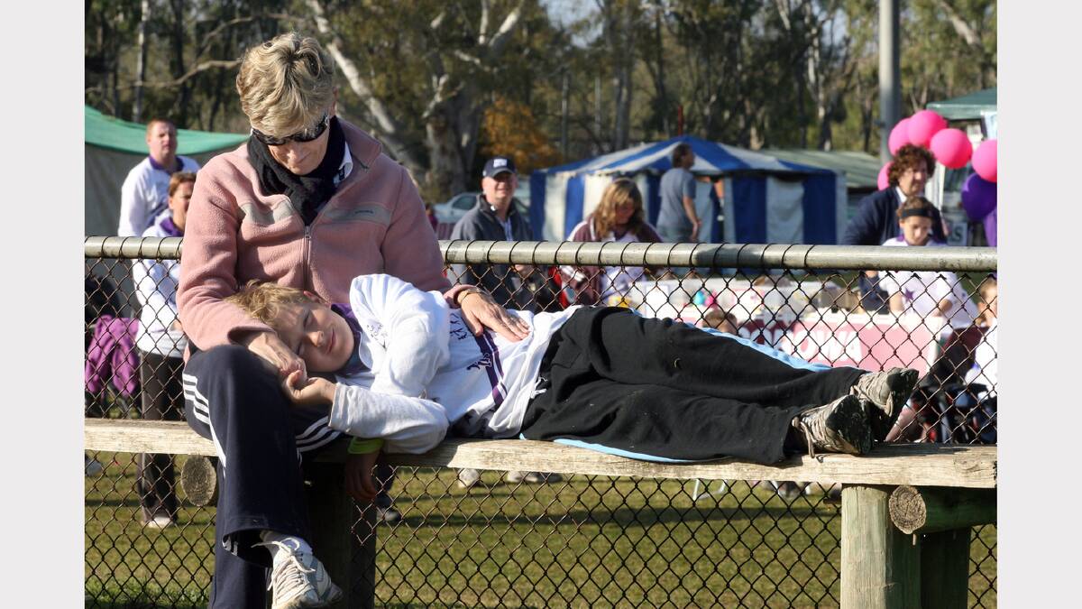 2008 - An exhausted Matthew Mills, 10, of Corowa, needs a nap on mum Karen's lap after walking all day.