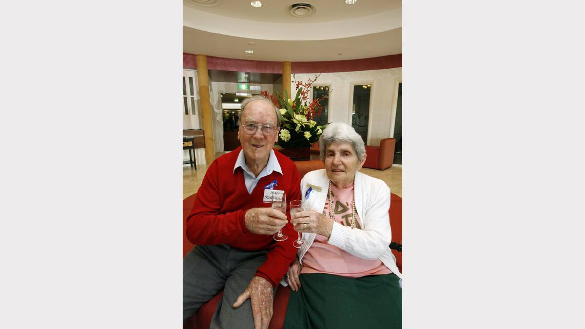 Bill Richardson and Betty McLean toasting the opening of the Westmont Aged Care Centre. 