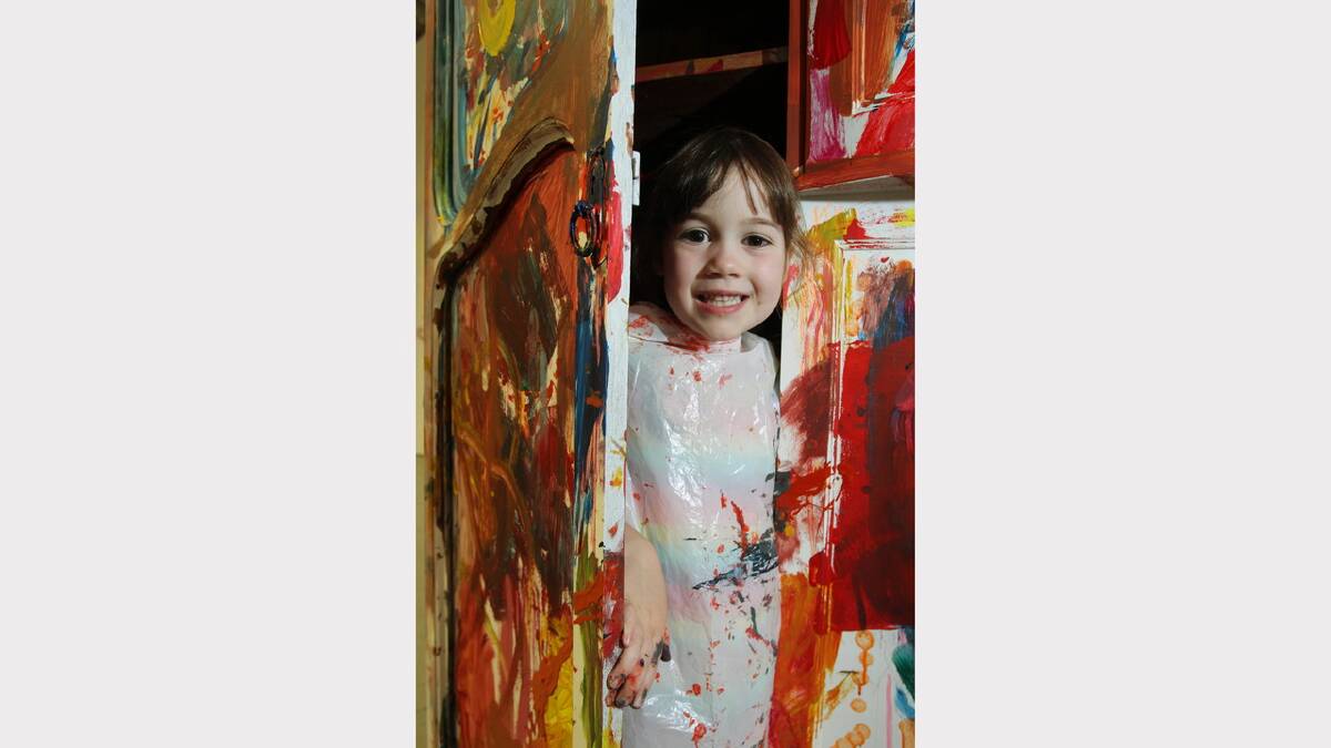 For Hollie Doogood, 5, painting a cupboard at the Kids Rule shed pictured below only half the fun. It also made a great place to hide. 