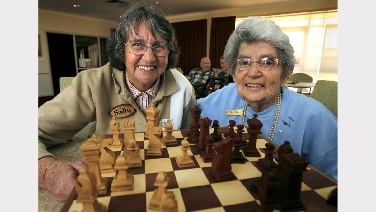 Westmont resident Betty McLean with a chess set donated to the home by woodcrafters. 