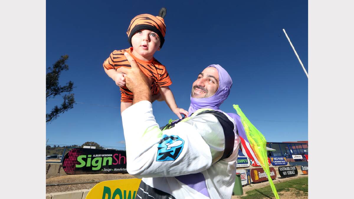 2012 - "Buzz Lightyear" Nick Georgiou soars through the Relay with his son "Tigger", otherwise known as Alexander Georgiou, 16 months. 