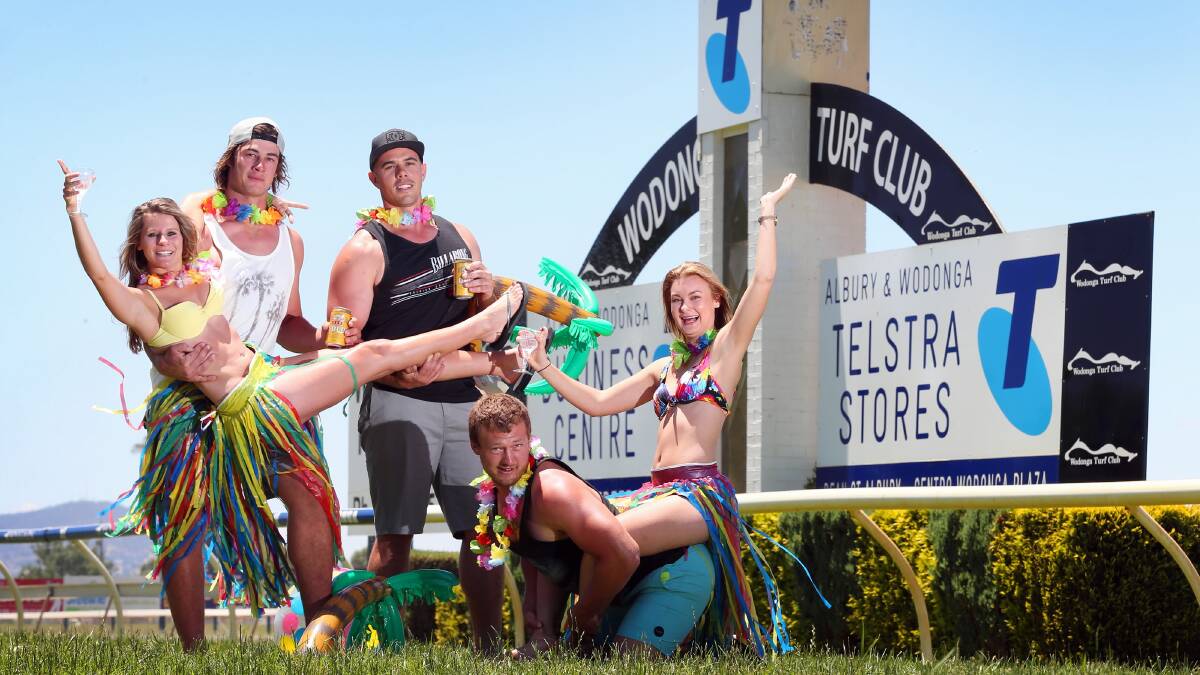 Racegoers at last year's beach party themed Boxing Day race event. 