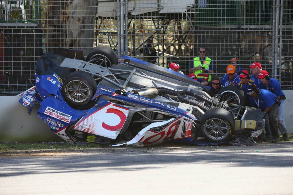 V8 supercar driver Jason Bright was lucky to escape after his car rolled during race three  of the V8 Supercars Championship Series at the Adelaide Street Circuit. Pictures: GETTY IMAGES