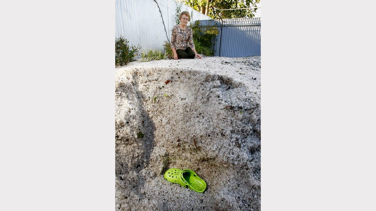 December 2008 - This lady's backyard was covered in hail 3 feet deep.