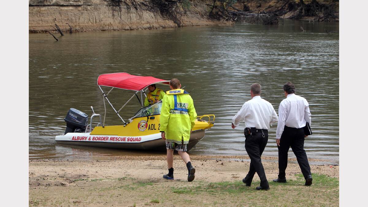 VRA rescue members take NSW Police detectives to the spot where Jovica Djukic's body was found. 