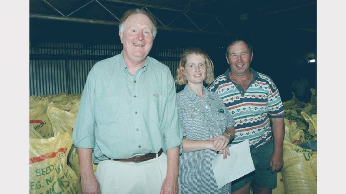 1999 - Agronomist John Sykes with NSW Agriculture agronomist Lisa Cary Castleman and Lowesdale grain grower Graeme Hicks.