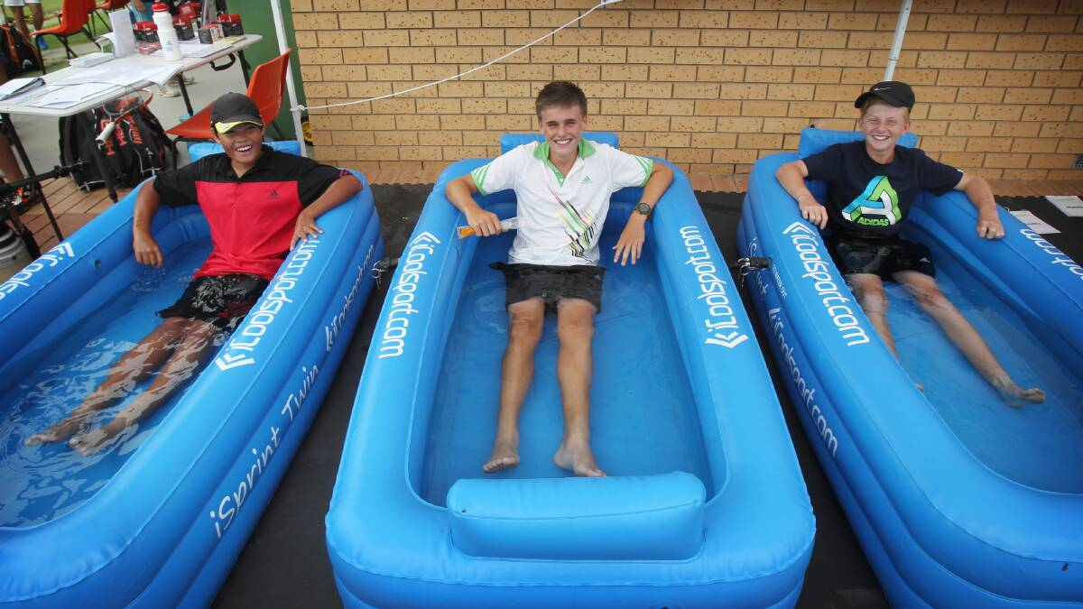 Josh Wirrell 13, Louis Clark, 14, and Brodie Green, 14, recover in the ice baths. Picture: MARK JESSER