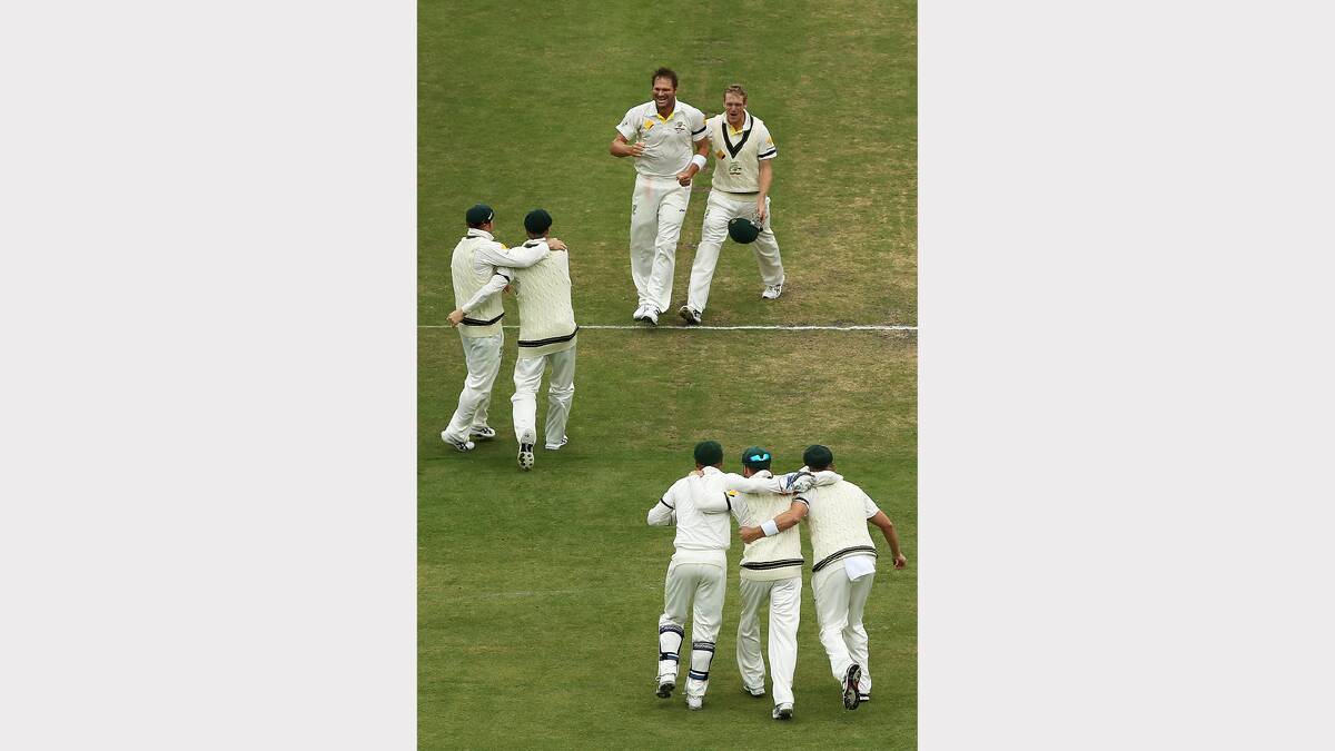 Australian players celebrate winning the game during day five of Second Ashes Test Match. Picture: GETTY IMAGES