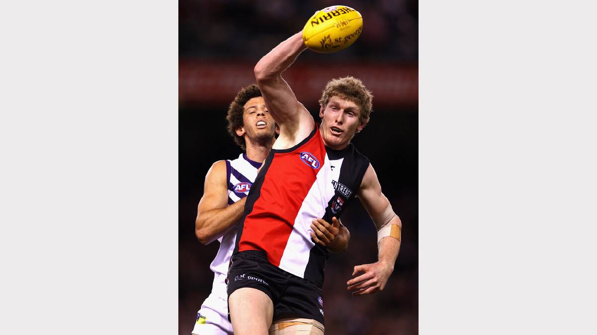 Zac Clarke of the Dockers contests a boundary throw in with Ben McEvoy of the Saints. Picture: GETTY IMAGES