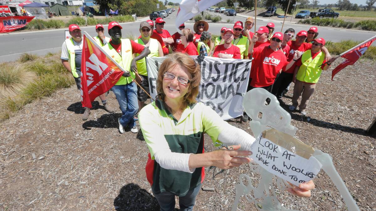 Distribution worker  Angela Haynes striking with her Barnawartha North colleagues over fair pay for regional workers. Pictures:  TARA GOONAN
