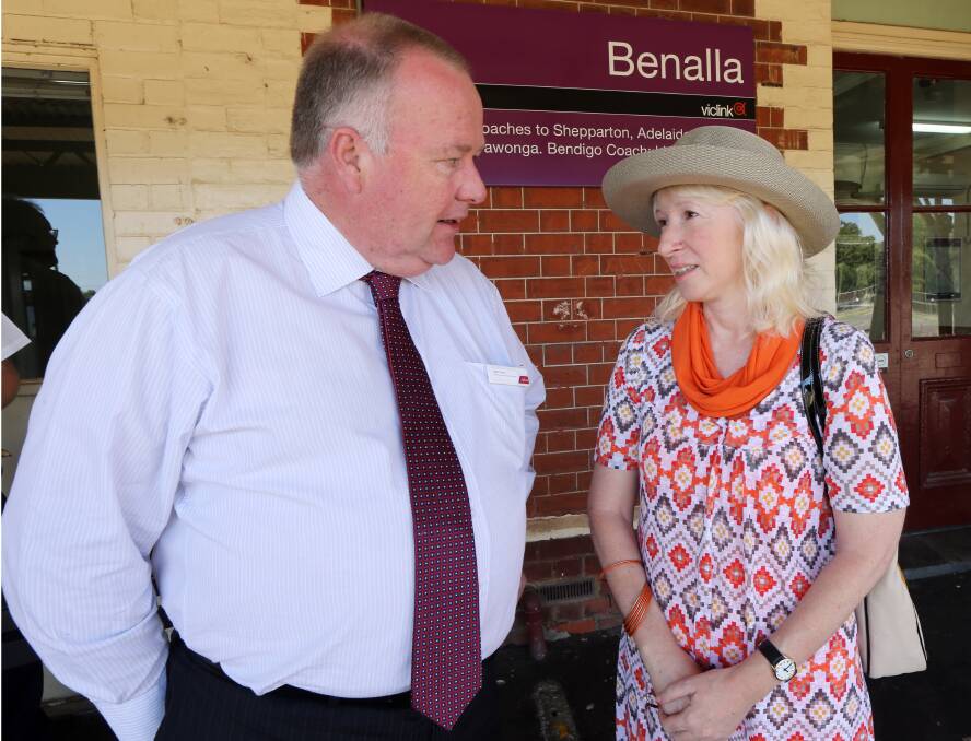 V Line marketing & communications manager Colin Tyrus speaks to reference group member Anna Smith, of Benalla.