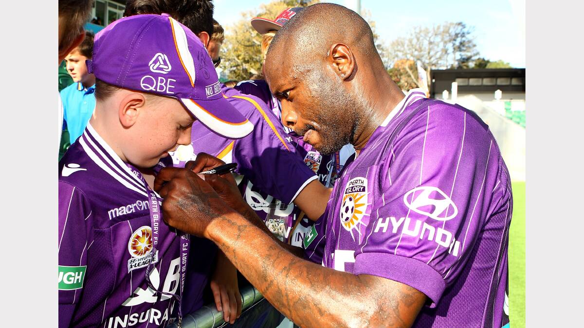 Glory's William Gallas signs autographs for fans. Picture: GETTY IMAGES