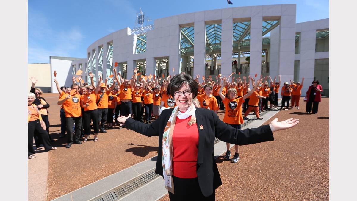 Member for Indi Cathy McGowan and her supporters outside Parliament House in Canberra.