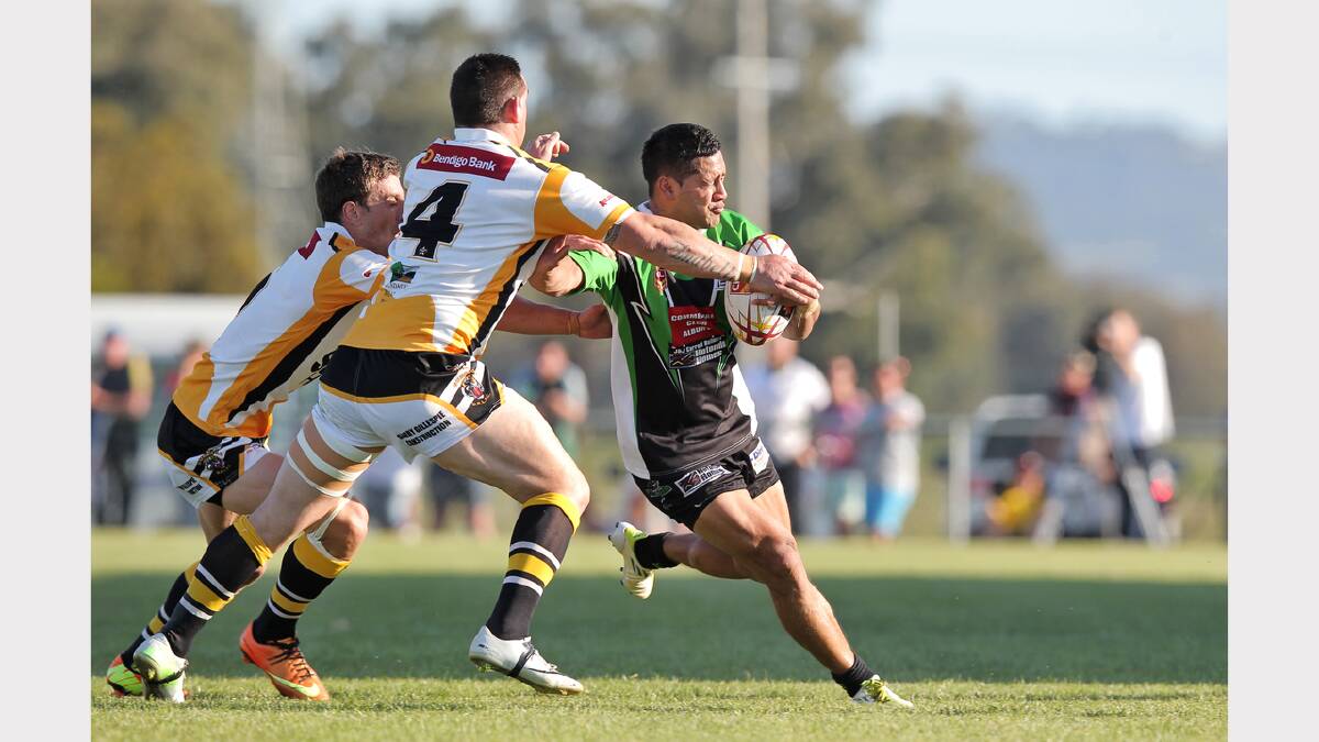 Albury's Dion Belford-Laulu takes fights off a double attack.