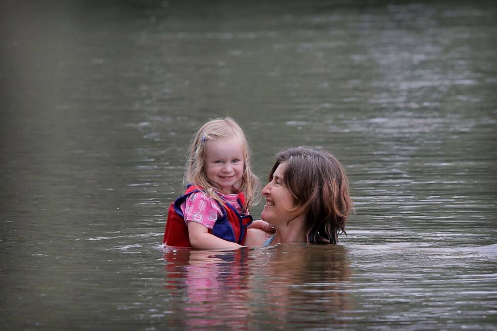 Table Top Grace Showers, 3,  and her aunty Katrina Kell, of Milawa, swimming in the Murray River at Noreuil Park.