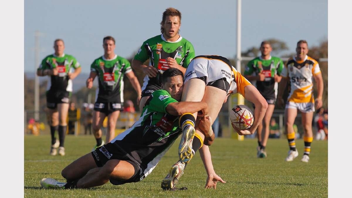 Albury's Dion Belford-Laulu takes down an opponent.