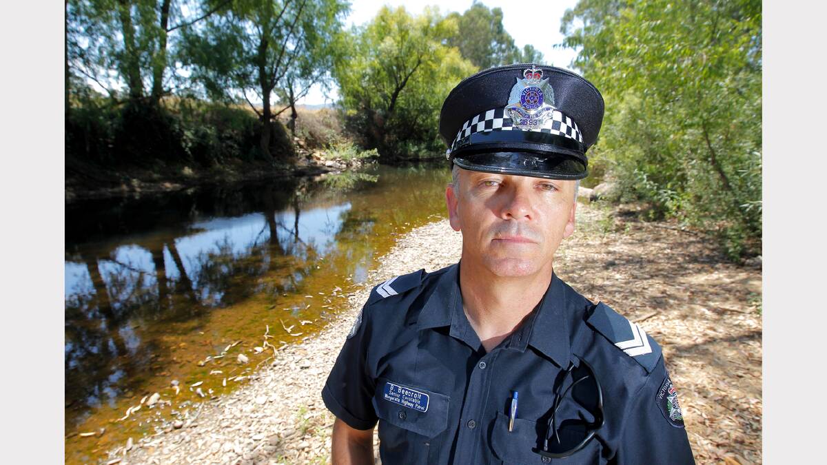 Senior-Constable Brad Beecroft at the scene of a drowning in Myrtleford. Picture: BEN EYLES