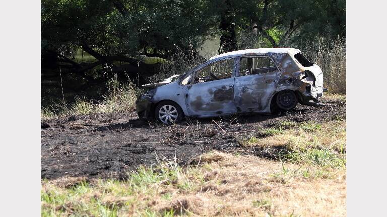 The remains of a Toyota Yaris torched at Bonegilla Island yesterday morning. Picture: MARK JESSER