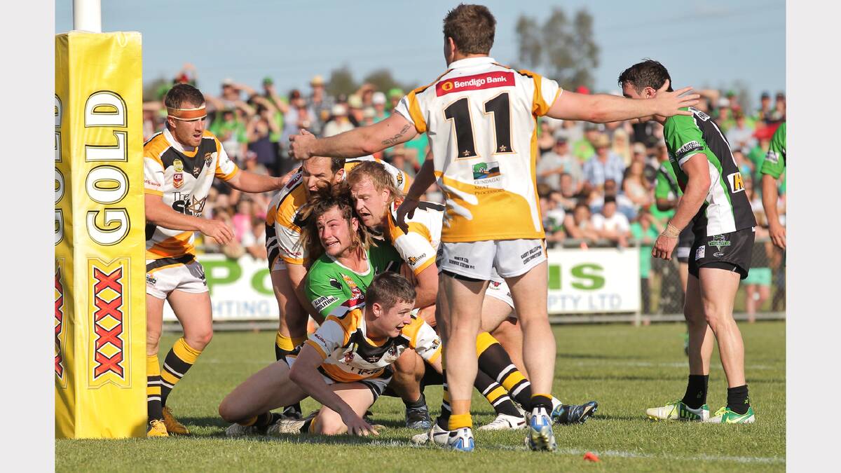 Albury's Andrew Cowhan pushes for a try.