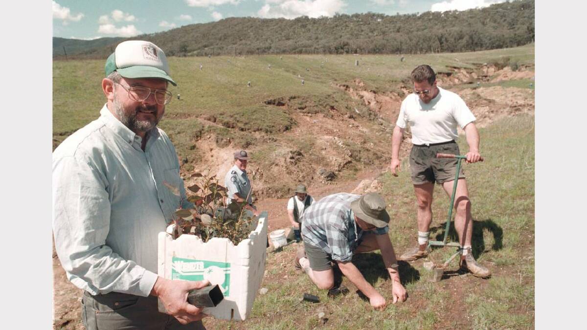 Prisoners from Beechworth Prison planting trees with the local Landcare group. Picture: RAY HUNT