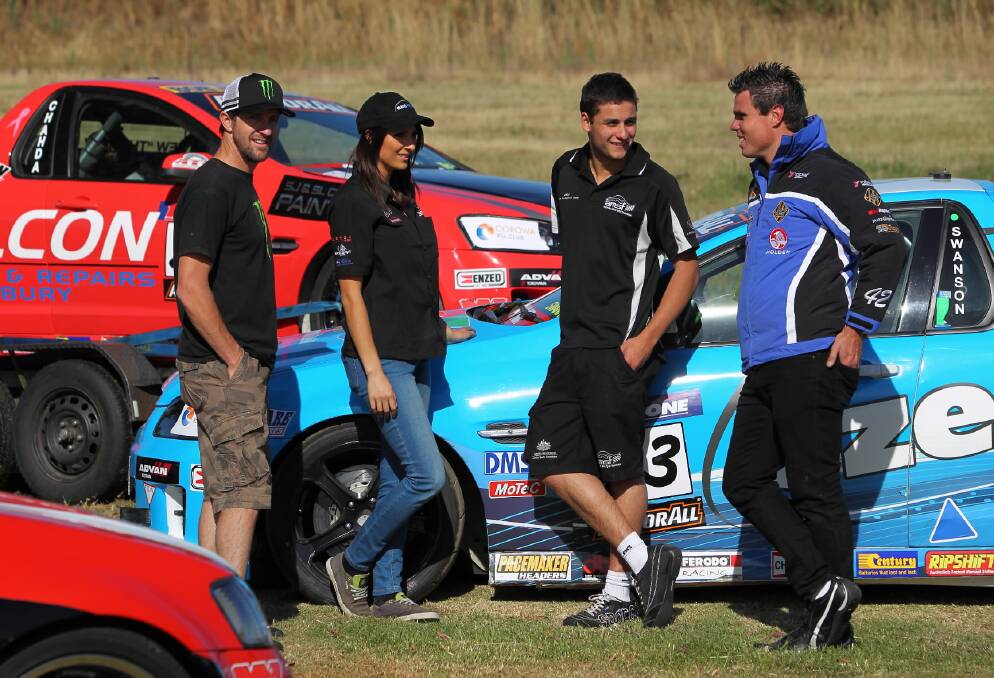 Nathan Pretty and Hayley Swanson, pictured with young up-and-coming race drivers Matt Chahda (crt, Chahda) and Tom Williamson,who will be competing in the V8 Utes at Winton this weekend. Picture: MATTHEW SMITHWICK