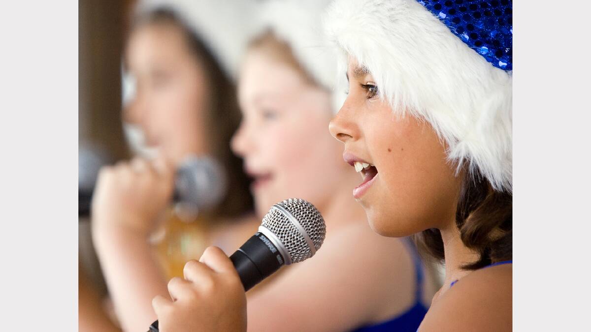 Wodonga Primary School's Jordyn Prospero, 9, sings for the crowd at the Mate Street Market. Picture: JOHN RUSSELL