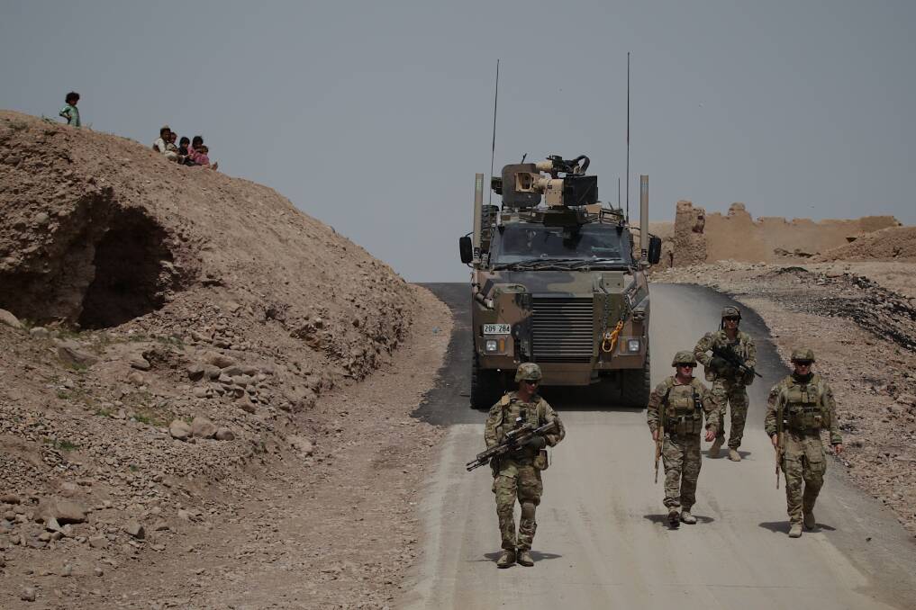 An Australian soldiers from the Provincial Reconstruction Team (PRT), during an operation to inspect a new road in the Oruzgan province, in Afghanistan, on 22 April 2013. Photo: Alex Ellinghausen