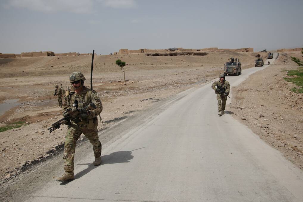 An Australian soldiers from the Provincial Reconstruction Team (PRT), during an operation to inspect a new road in the Oruzgan province, in Afghanistan, on 22 April 2013. Photo: Alex Ellinghausen