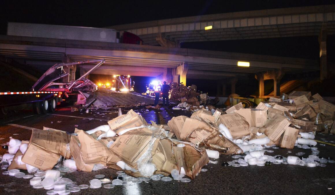 A destroyed truck being blown off the 40 freeway is pictured with its damaged cargo after a tornado swept through Shawnee, Oklahoma. Photo: REUTERS