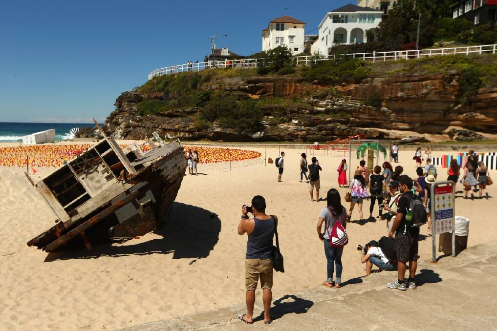  'Washed Up' by artist Tunni (Antony) Kraus is displayed on Tamarama beach during the 2013 Sculptures by the Sea exhibition at Bondi. (Photo by Cameron Spencer/Getty Images)