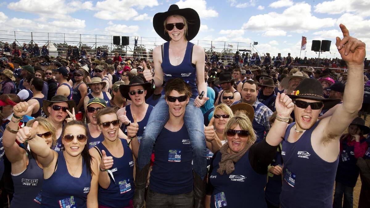 2012: Revelers are seen in the bull ring attempting to break the world record for wearing the most blue singlets together. Picture: Paul Jeffers