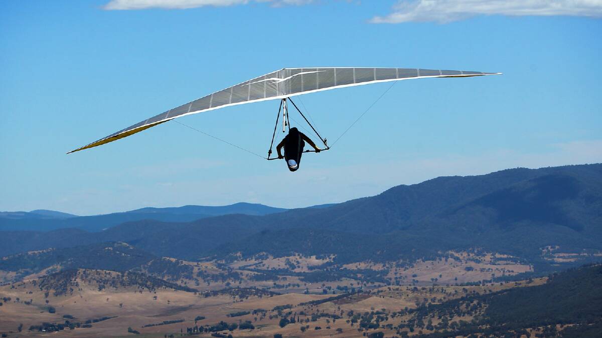 A hang-glider pilot launches into the air during the Corryong Cup Hang Gliding Competition. Picture:  MATTHEW SMITHWICK